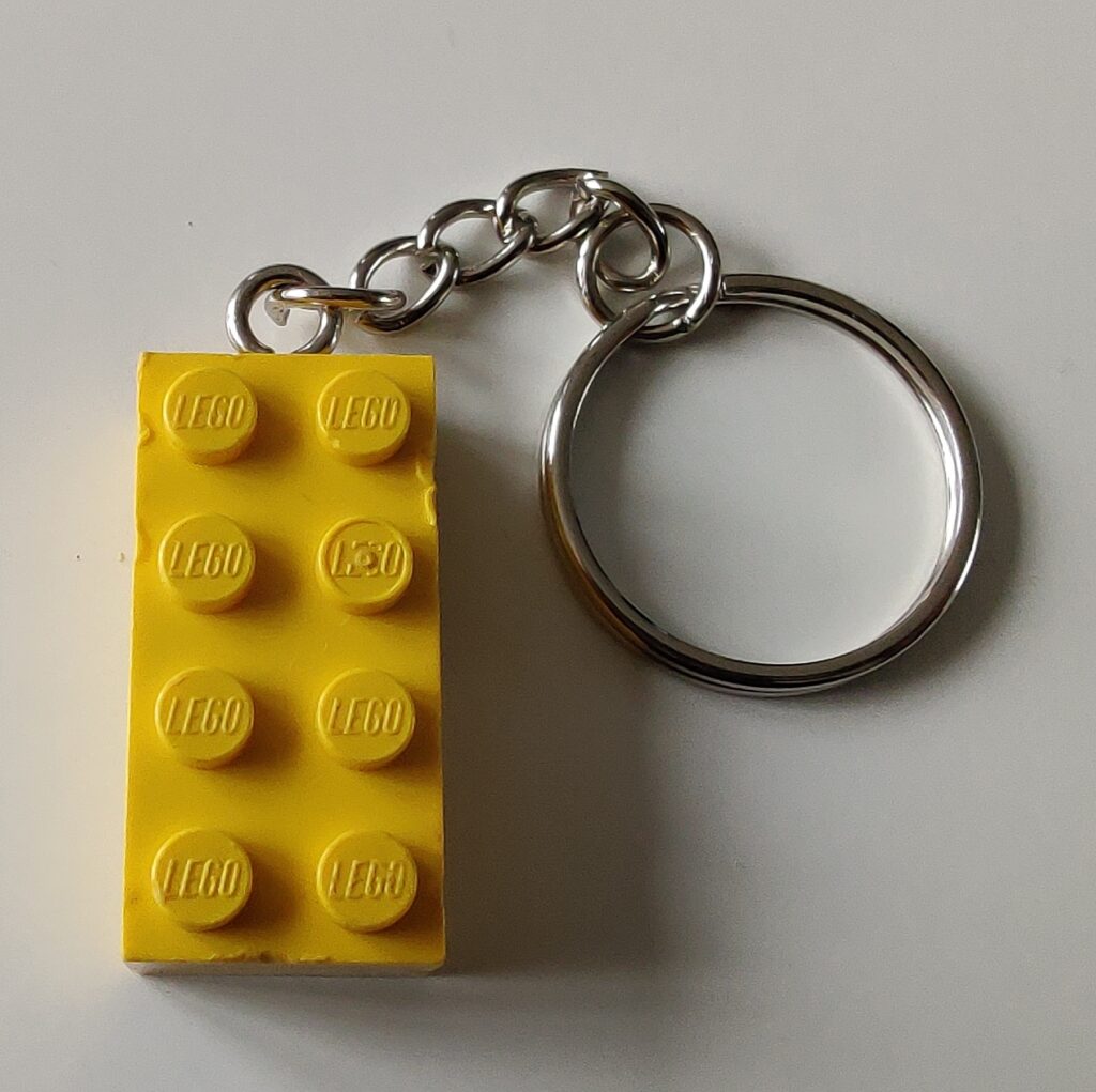 A 2x4 stud toy brick on a keyring.